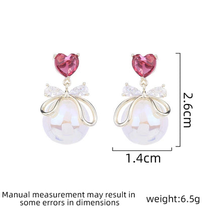 Ladies' light luxury design elegant heart-shaped bow imitation pearl earrings fashionable and versatile niche design earrings